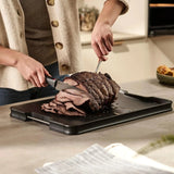 Joseph Joseph Cut And Carve Chopping Board In Black