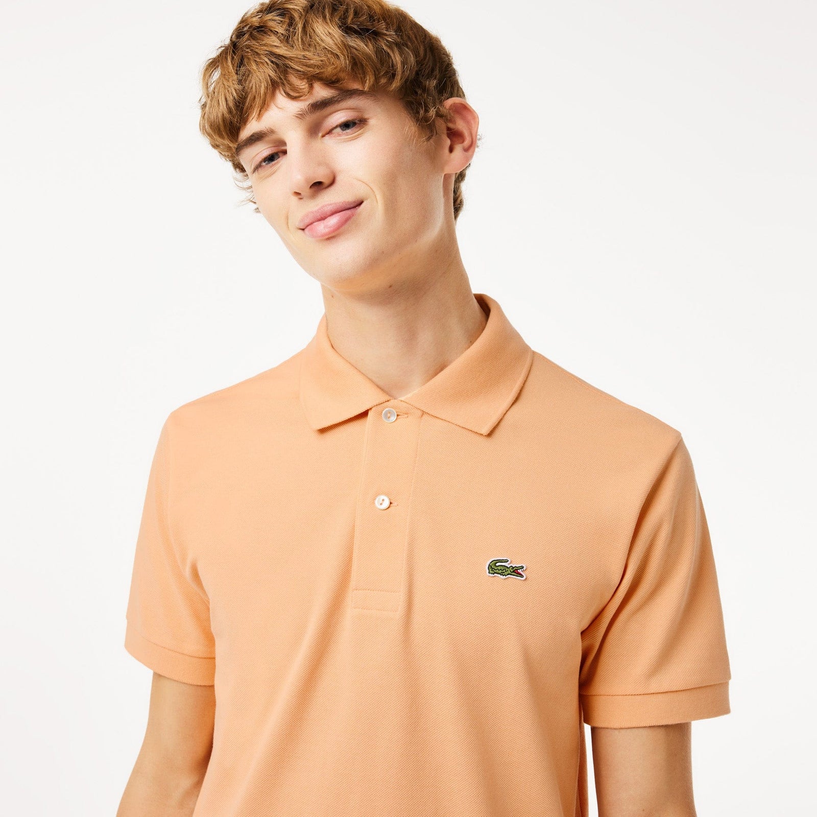 Lacoste Original L.12.12 Petit Pique Cotton Polo Shirt in Light Orange